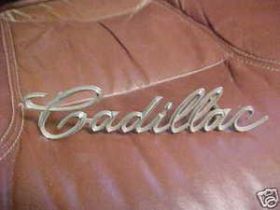 1964-cadillac-grille-script-emblem-used